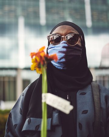 London, England, United Kingdom - June 6th, 2020: Woman in hijab and face mask