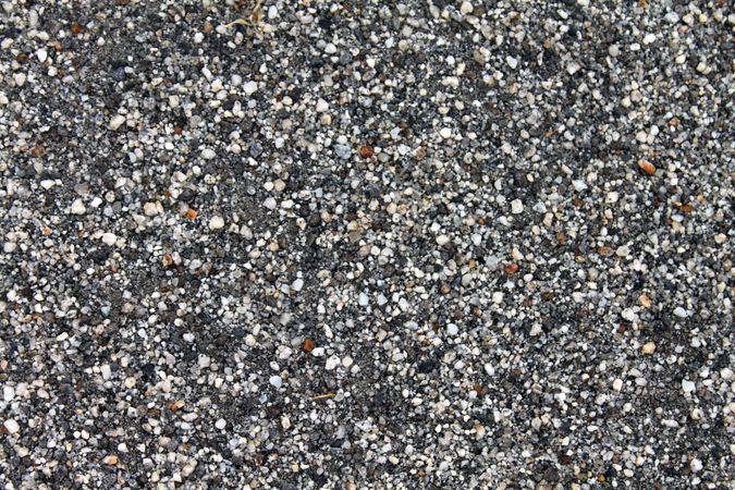 Close up top view of grey pebbles