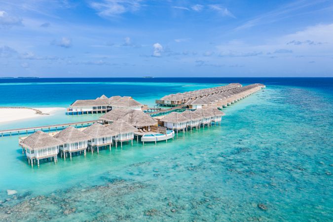 Overwater bungalows in a Maldives beach resort