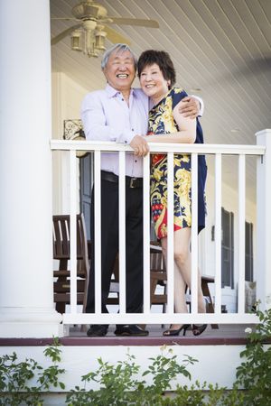 Chinese Couple Enjoying Their House