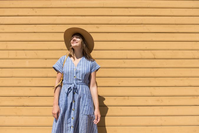 Young woman enjoying sunshine in summertime