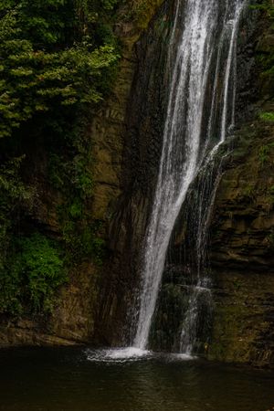 Bottom of lush waterfall