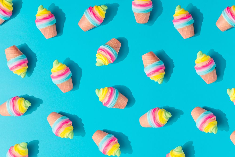 Colorful ice cream pattern on bright blue background
