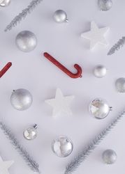 Top view of silvery and red Christmas decorations