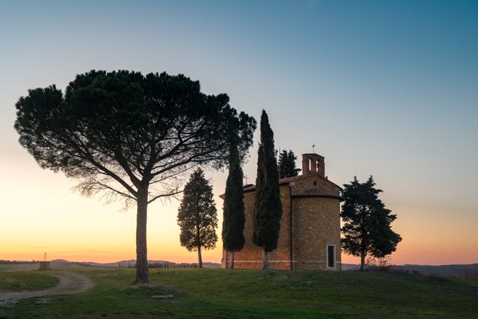 Single chapel among trees on field