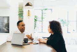 Man and woman having a business meeting in office