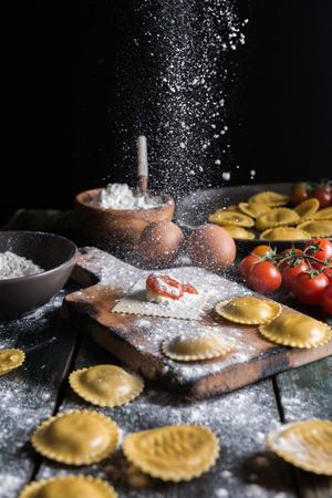 Homemade ravioli made with parmesan cheese, tomato and basil.