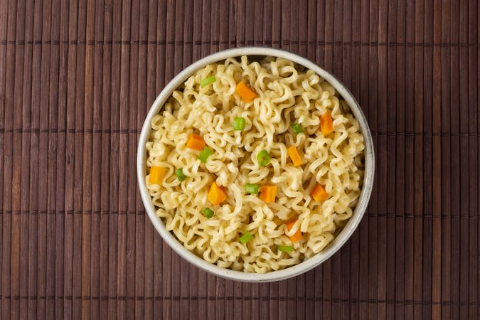 Bowl with instant noodles on the table.