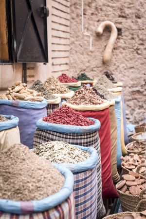 Baskets with dried spices on marketplace