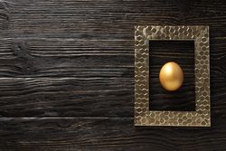 Golden egg, pension savings, investments, retirement, space for text