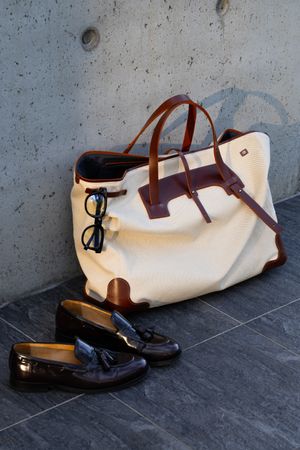 Gentleman’s Bag With Loafers And Sunglasses
