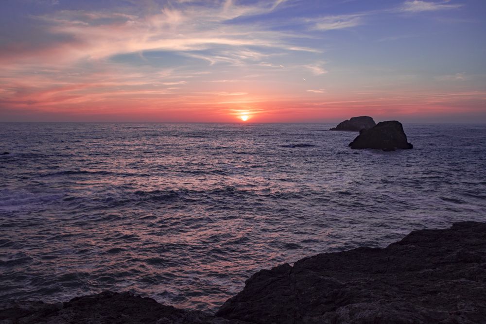 Looking out at scenic sunset over the Pacific Ocean