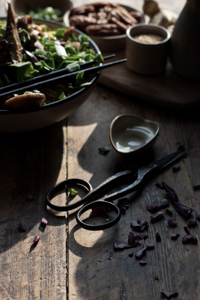 Miso noodles with egg plants and shiitake in bowl on table