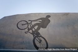 Shadow of cyclist 4BGzPb