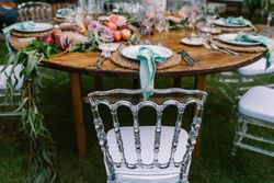 Wedding table decoration in rustic style placed outdoors