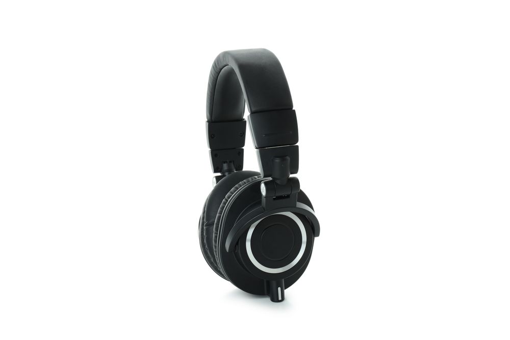 Modern headphones isolated on a plain background