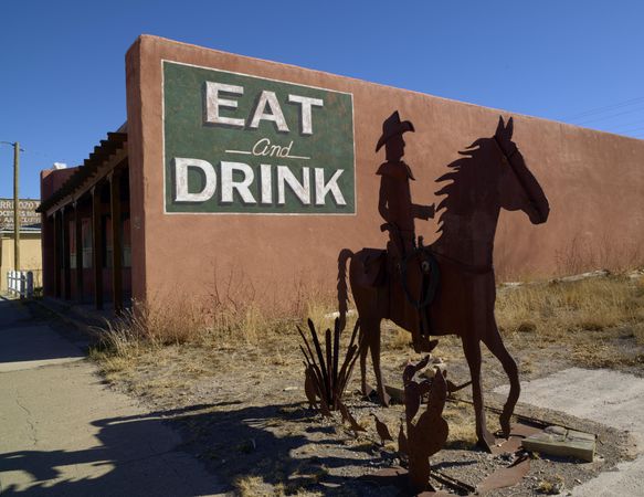 Cowboy figure outside a cafe, Carrizozo, New Mexico