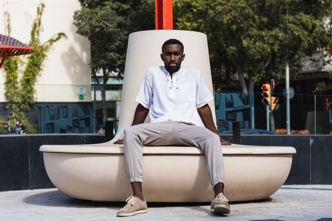 Stylish Black man in city street