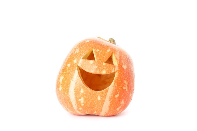 Halloween decorative pumpkin isolated on plain background