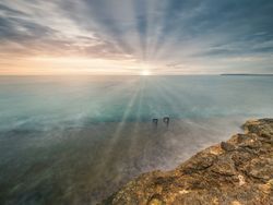 Sun rising over beautiful sea