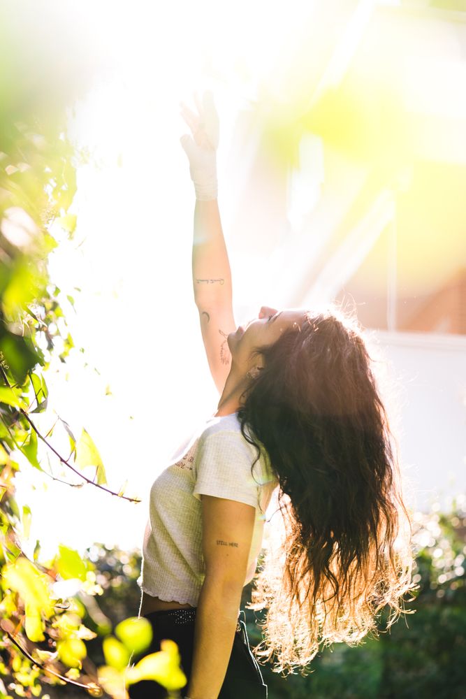 Cheerful woman in garden
