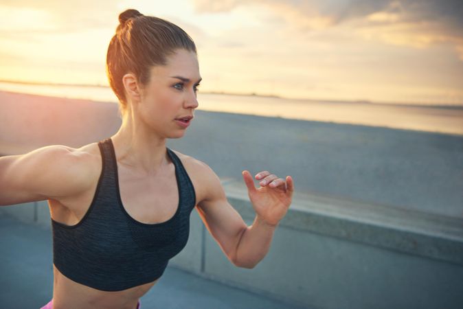 Woman running intensely in the morning