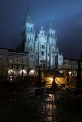 Santiago de Compostela Cathedral view at misty foggy night after rain. Cathedral of Saint James pilgrimage. Galicia, Spain