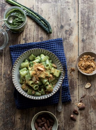 Pasta paccheri with kale pesto and nuts