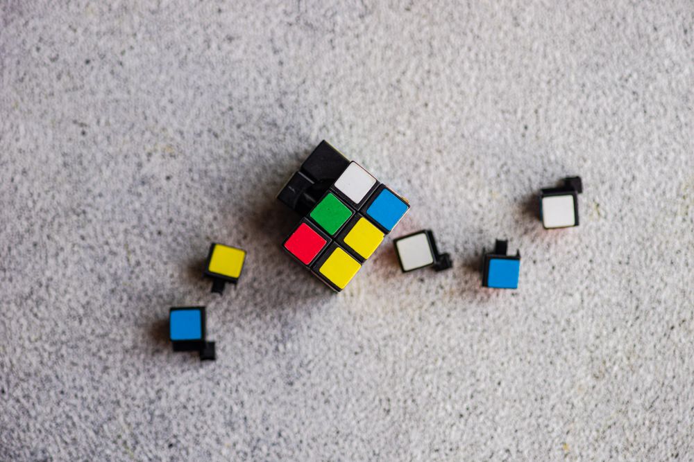 Rubik's cube details on the concrete background