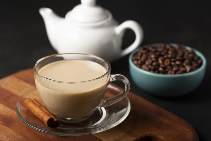 Cup of coffee with creamy milk.