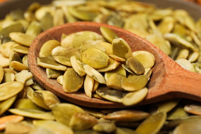 Cooking ingredients for fall season - pumpkin seeds, pumpkin