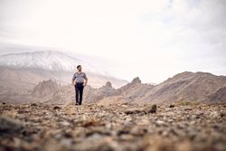 Man contemplating mountain view