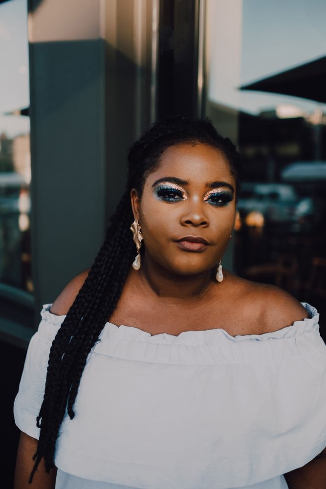 Content trendy Black woman on street