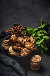 Dates fruits with walnuts, mint and cinnamon for Ramadan