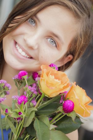 Young Girl Holding Flower Bouquet at the Market