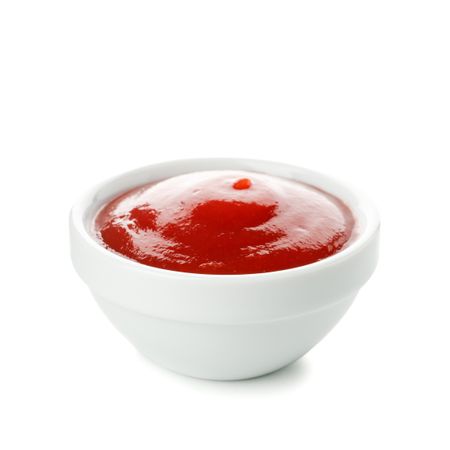 Bowl of tomato sauce isolated on blank background