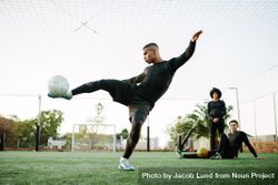 Skilled soccer player kicking ball bDnqK5