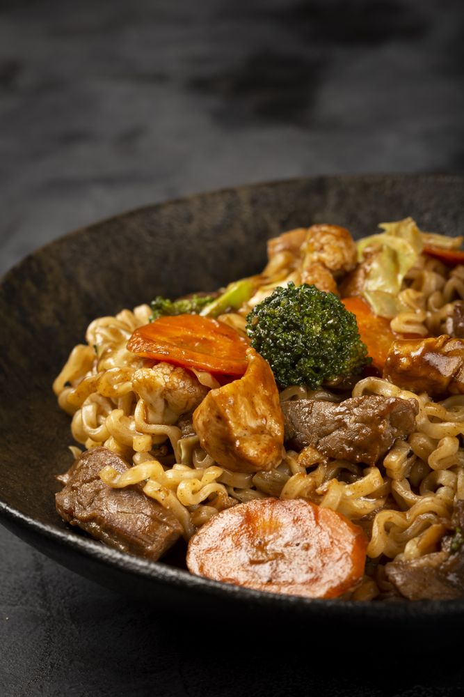 Yakisoba noodles. Yakisoba dish with meat, chicken and vegetables.