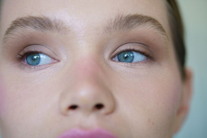 Close-up of a woman with blue eyes