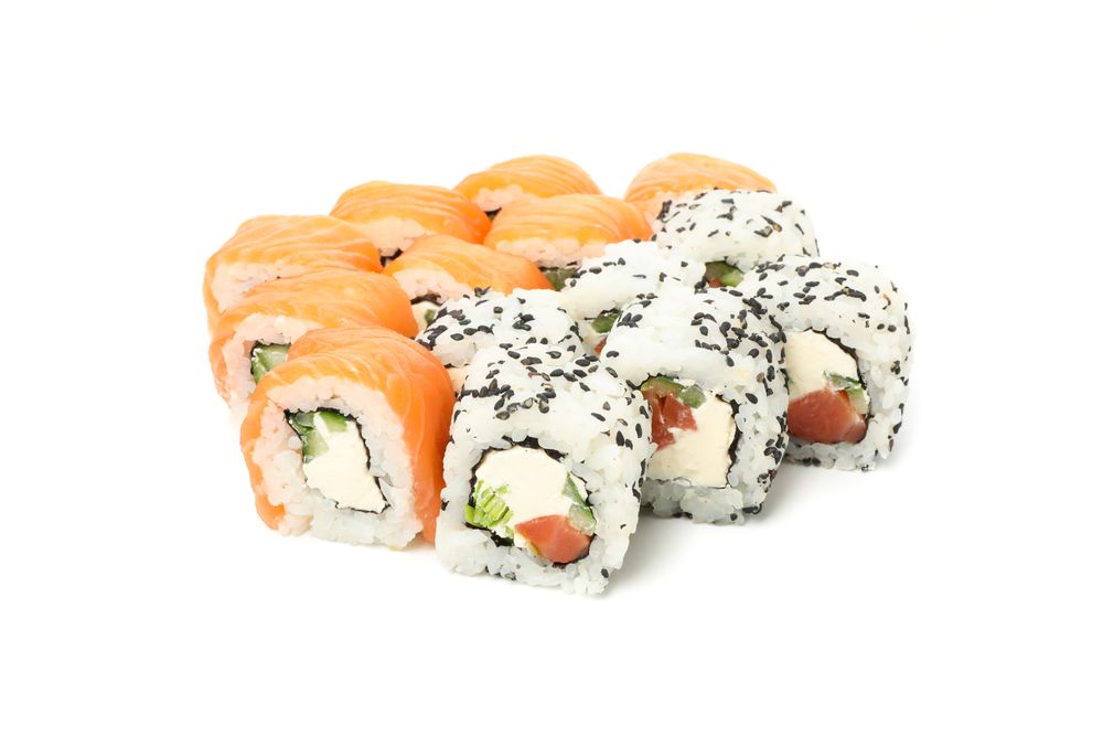 Japanese food. Delicious sushi rolls isolated on light background