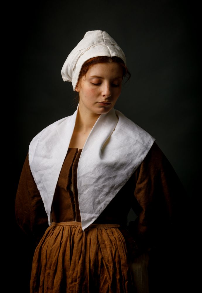 Medieval maid posing in studio