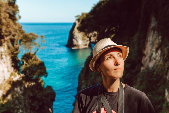 Female tourist contemplating landscape on daytime