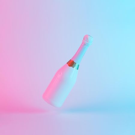 Champagne bottle with colorful ultraviolet holographic neon lights