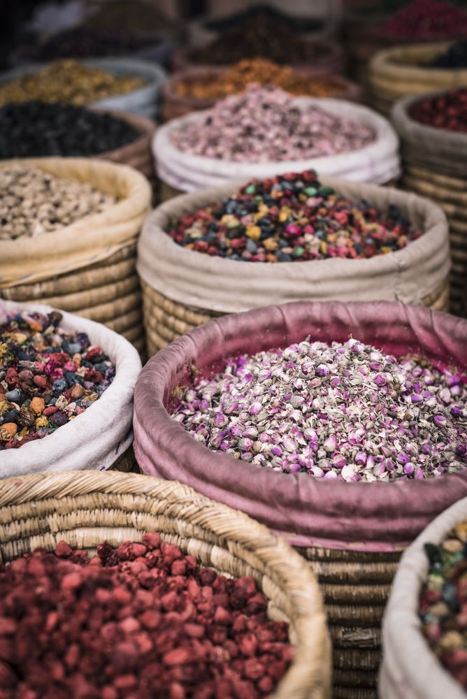 Baskets with dried spices on marketplace