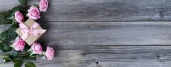 Mother’s Day celebration with lovely pink roses and gift box
