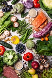 Flat lay of fresh vegetables, fruit and fish