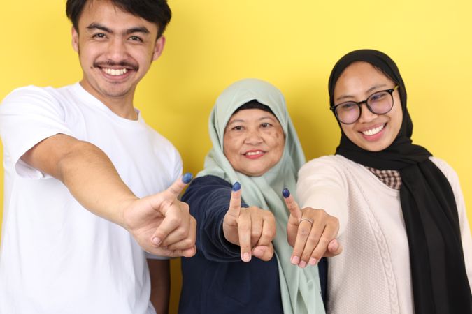 Three People Indonesian Family Showed Tinta Pemilu, Inked Finger