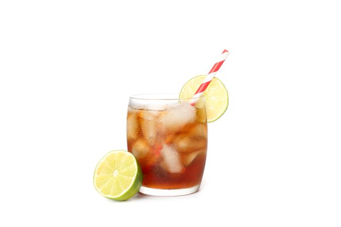 Glass of cold cola isolated on blank background