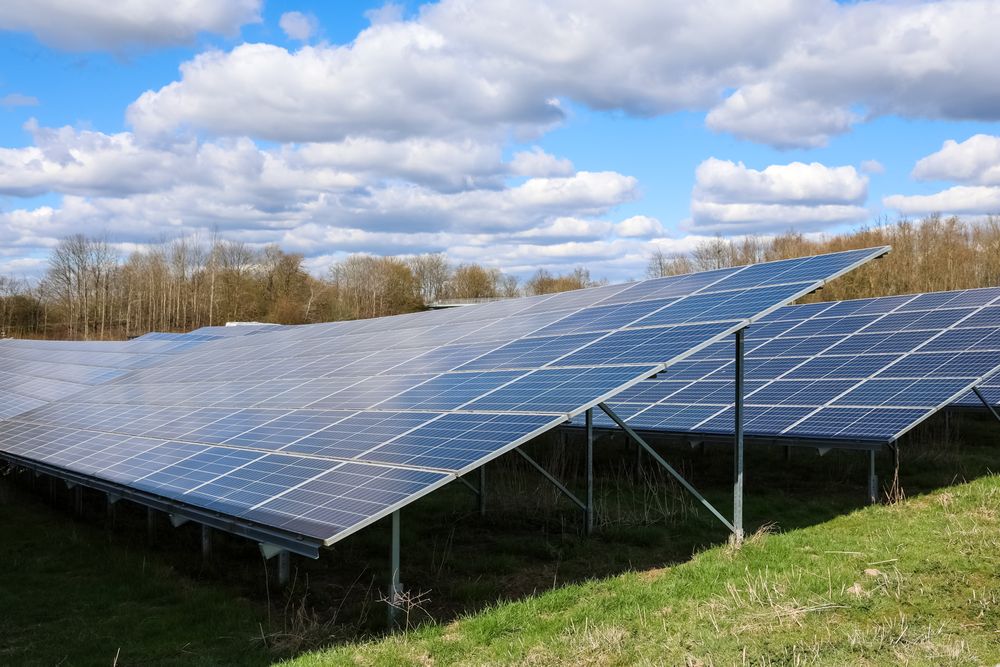 Solar panels providing renewable energy under cloudy sky