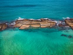 Clear waters and rocks in ocean